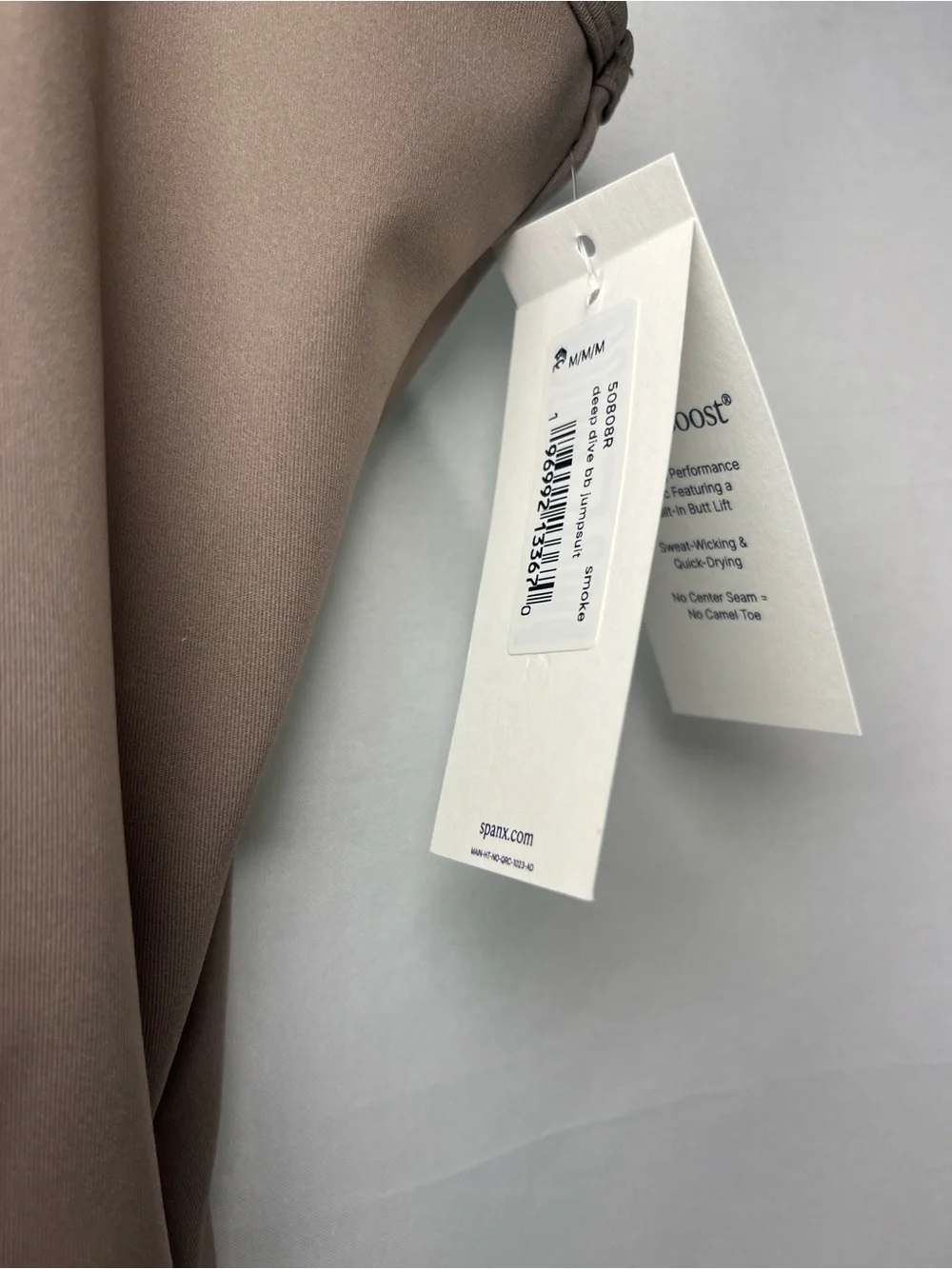 Spanx NWT booty boost deep dive stretch v neck jumpsuit athleisure sz m